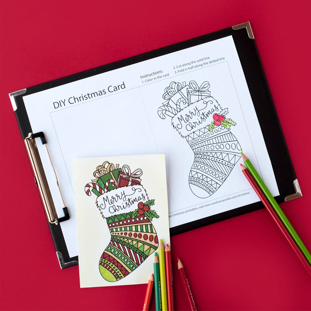 This free printable Christmas card is fun to color in and a great way to personalize your Christmas gifts! This is a sample card from my pack of 20 coloring cards for Christmas #free #christmas