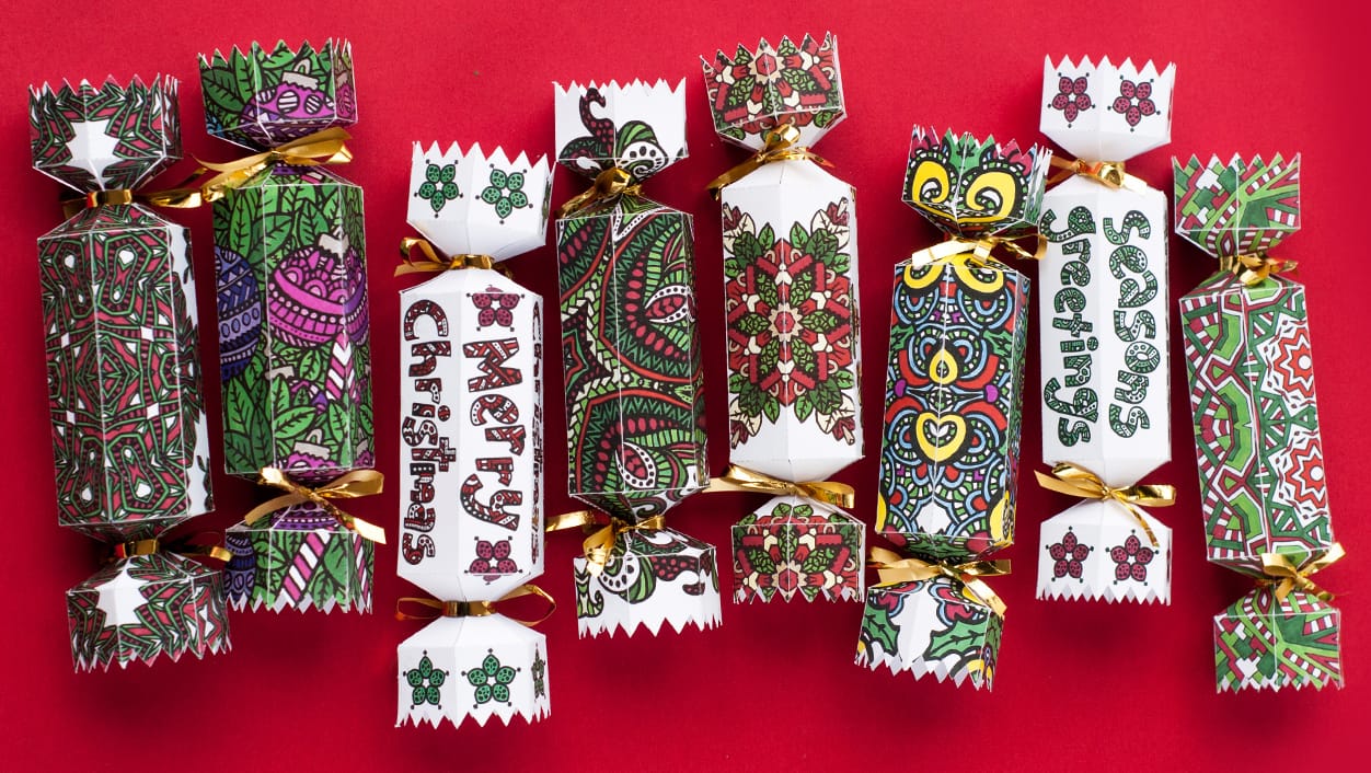 Make your own Christmas crackers with these 8 coloring cracker designs! | Find more Christmas printable activities and coloring pages at www.sarahrenaeclark.com/christmas