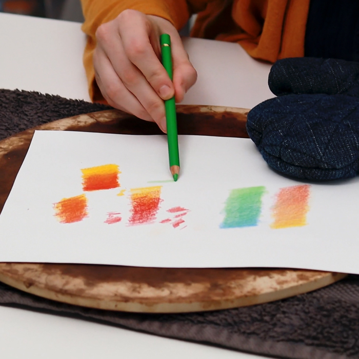 Using heat to blend color pencils