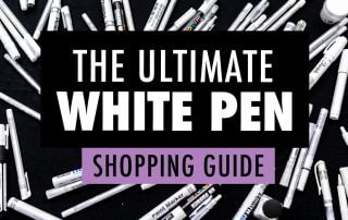 A collection of white pens on a black background