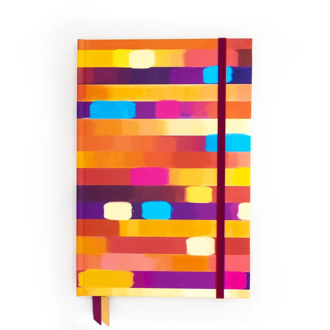 A5 Lined or Dotted Sunset themed Journal with a scratch-resistant hardcover, lay flat binding and double bookmark. It's has thick paper and comes with 160 pages.