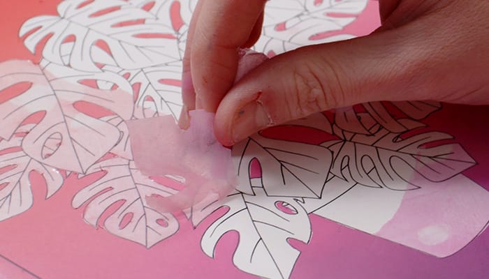removing masking film from coloring page