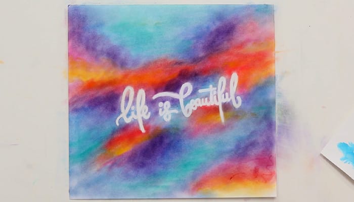 Completed coloring page of life is beautiful using pan pastels