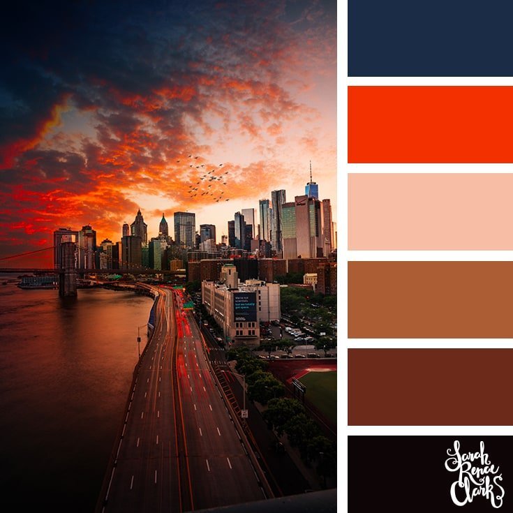 Color Palette 482 - an orange sunset fading to a black sky behind a city scape