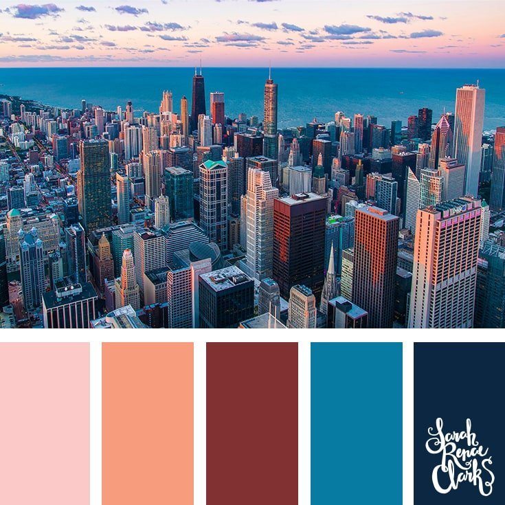 Color Palette 495 - A pastel rainbow sky with the sun setting over the ocean, behind a city scape