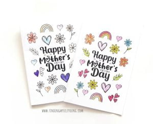 Free Printable Happy Mother's Day Coloring Card from Finding Myself Young that has rainbows, florals, heart and more.