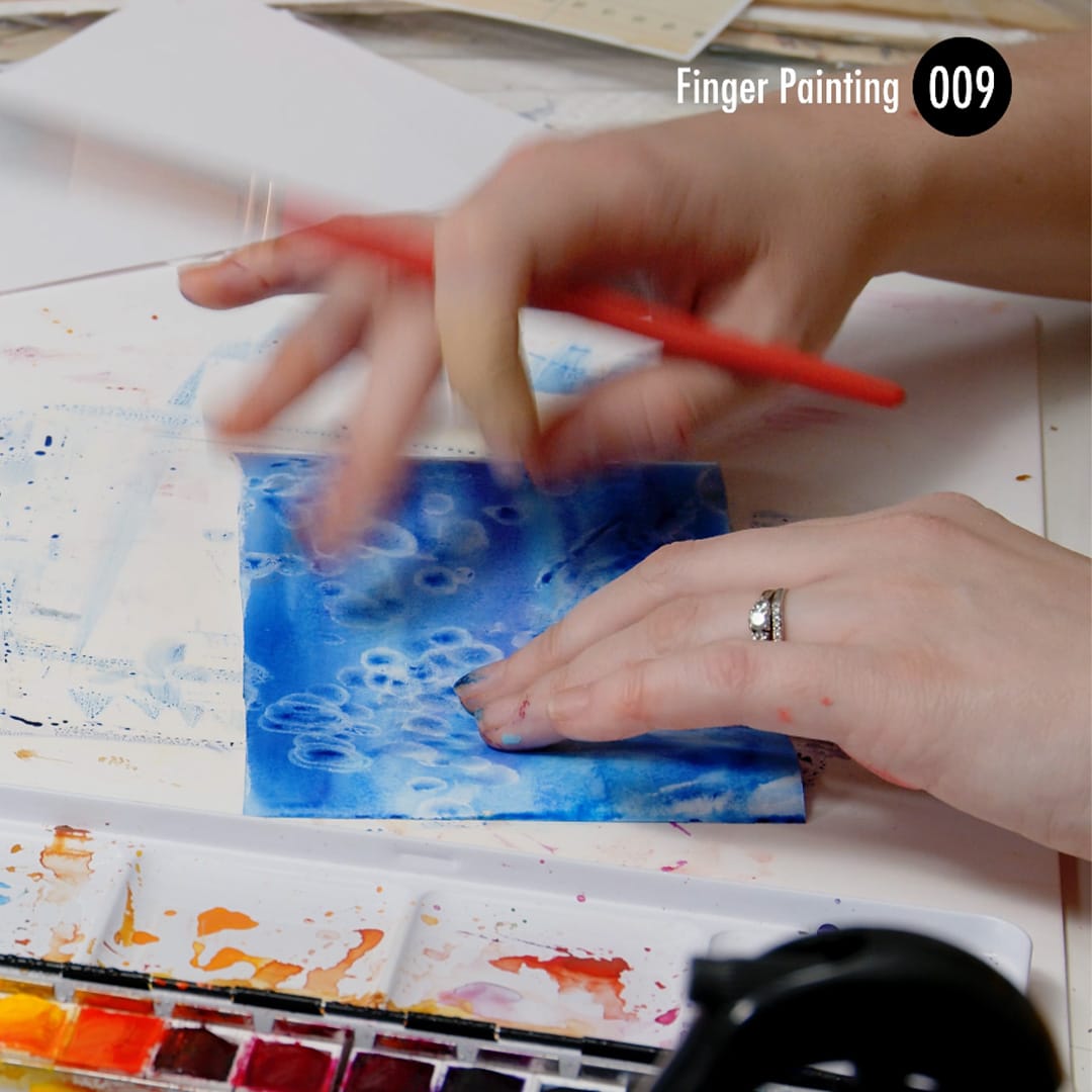 Finger painting in mixed media can be fun and add great texture in your art journalling book